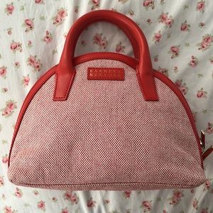 Beautiful barney’s new york red bag with long attachment to wear around neck